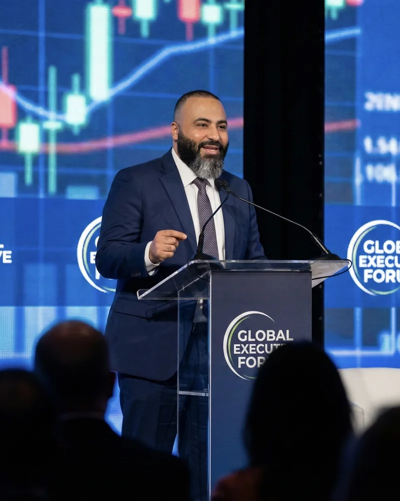 Mustafa Elsafy speaking at a professional event